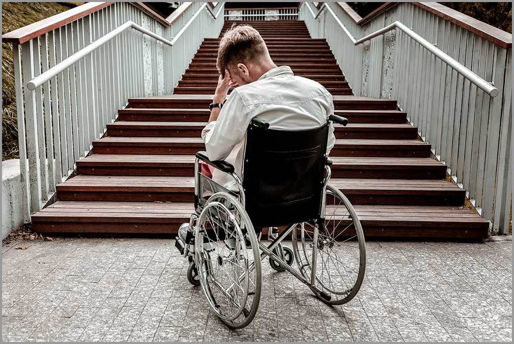 disabled person looking at stairs