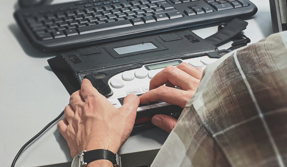 man using an accessible keyboard